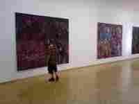 Lukáš Hladík in front of the painting by Otto Placht